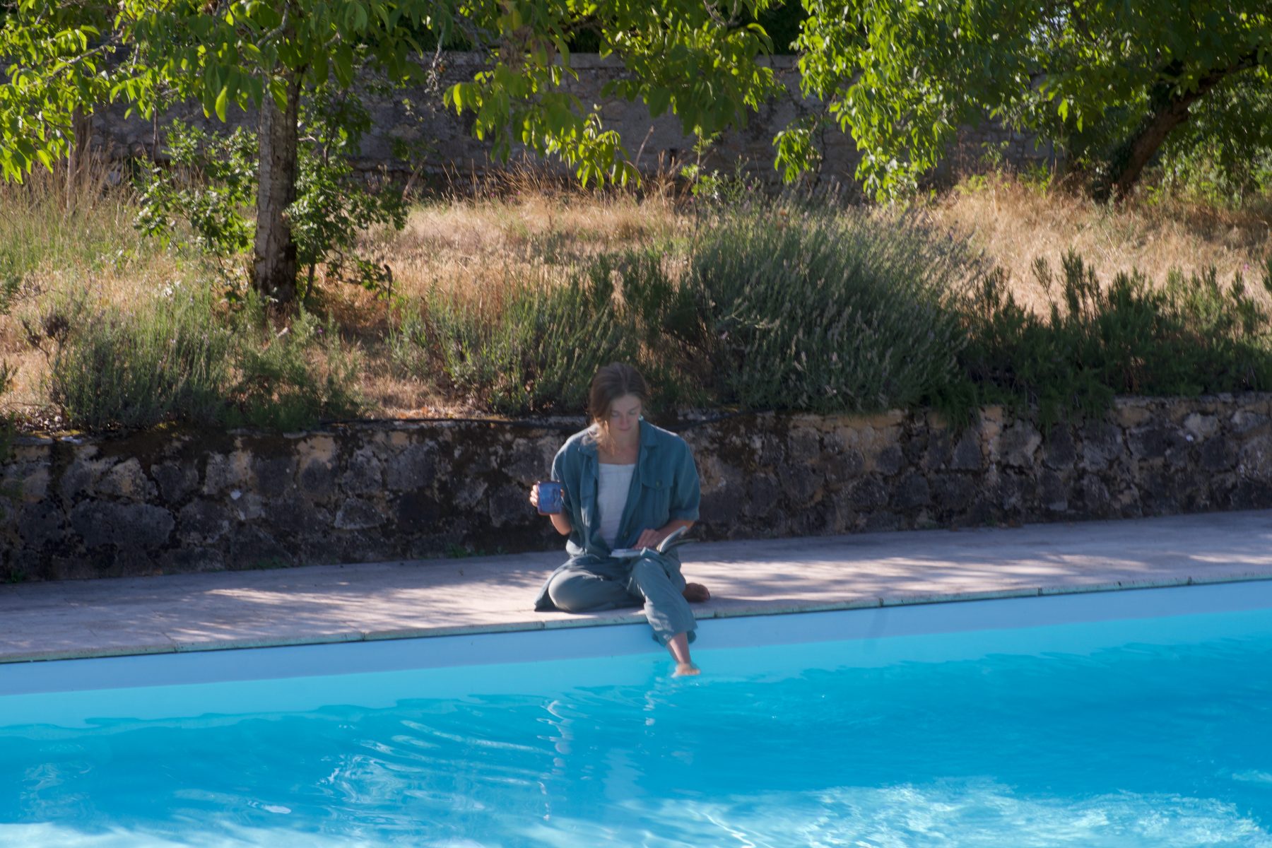 Reading at the poolside